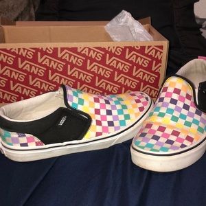 Multicolored checkered vans it says there’s two because someone cancelled order